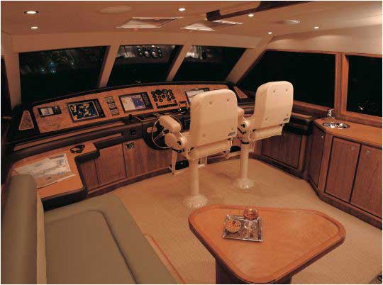 This is from the Bertram 670e and it features a settee just aft of the helm. This is from the Bertram 670e and it features a settee just aft of the helm.