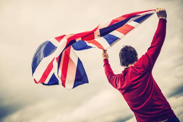 Man-waving-Union-jack-flag.jpg